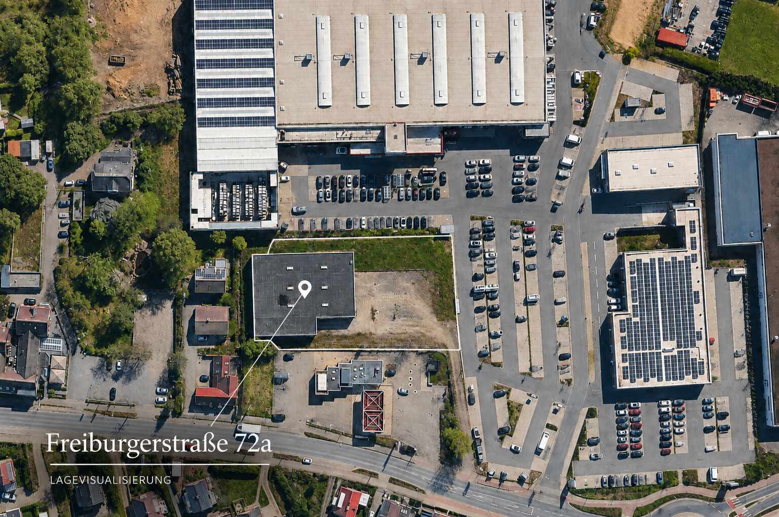 Senkrechte Luftaufnahme des Grundstücks mit markierter Halle